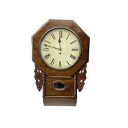 English - late 19th century drop dial 8-day fusee wall clock in a mahogany case, with an octagonal wooden dial bezel and carved ear pieces, pendulum viewing glass and curved base with pendulum adjustment door,  12