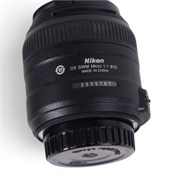 Two Micro-Nikkor camera lenses, comprising AF-S DX 40mm 1:2.8G with user manual, serial no. 2055767 and a 55mm 1:3.5 serial no. 1051782