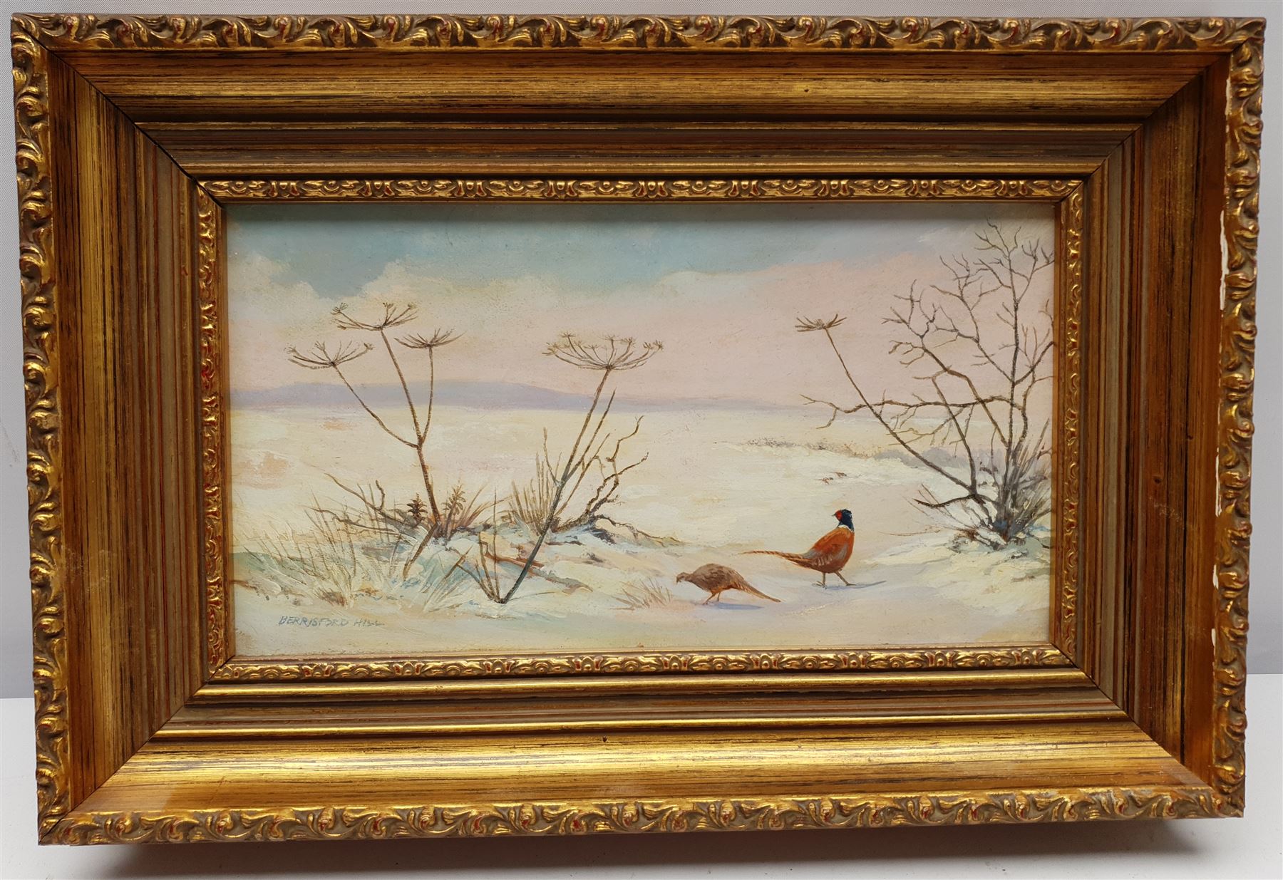 Berrisford Hill (British 1930-): Pheasants in the Snow, oil on board signed 12cm x 24cm