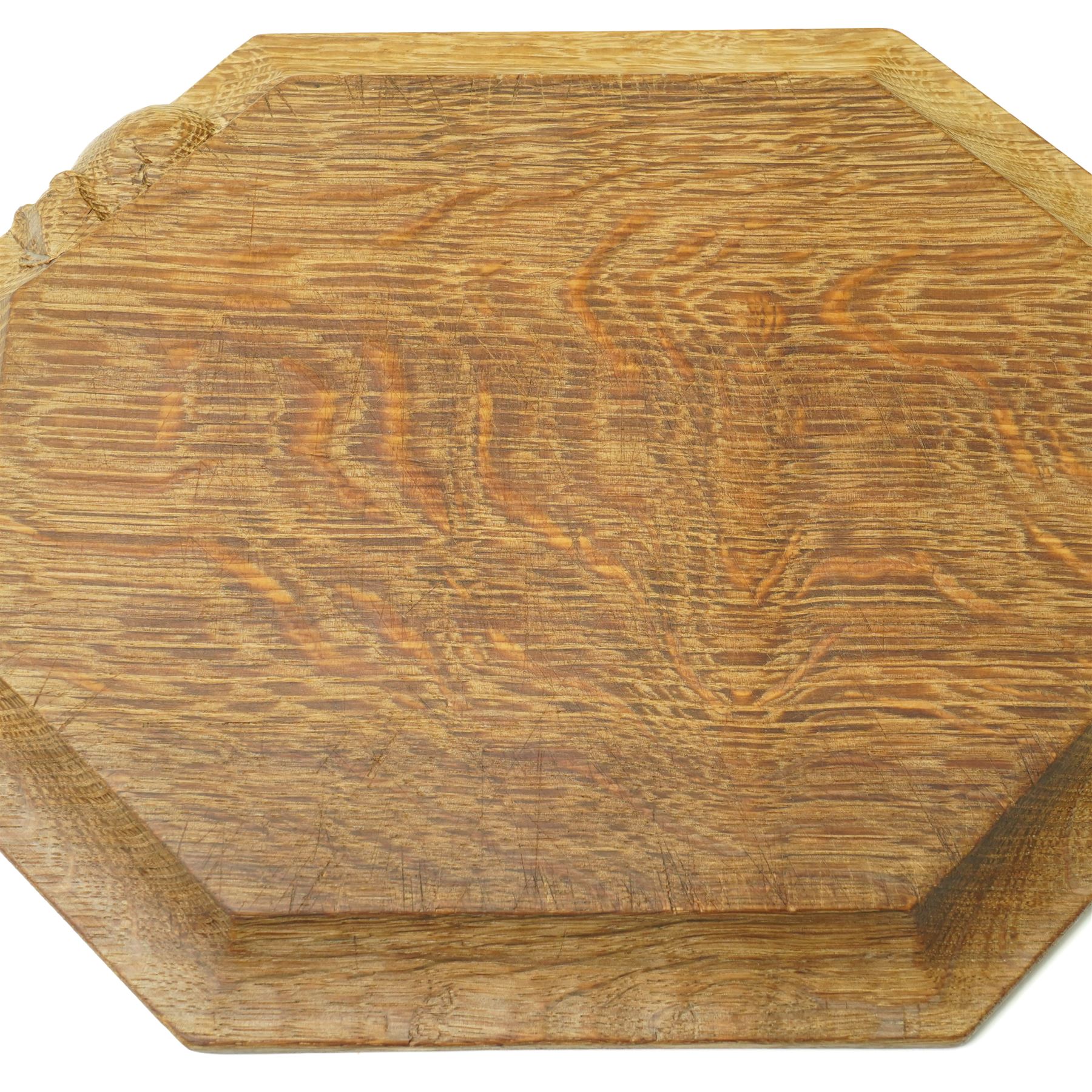 Mouseman - oak chopping board, of canted octagonal form, with carved mouse signature, by the workshop of Robert Thompson of Kilburn