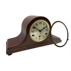 A mahogany cased Tambour clock with a German eight-day movement sounding the quarters and hours on gong rods, with a 6” silvered dial , Arabic numerals and minute track, steel spade hands within a spun brass bezel and convex glass.
With pendulum. 




