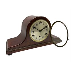 A mahogany cased Tambour clock with a German eight-day movement sounding the quarters and hours on gong rods, with a 6” silvered dial , Arabic numerals and minute track, steel spade hands within a spun brass bezel and convex glass.
With pendulum. 




