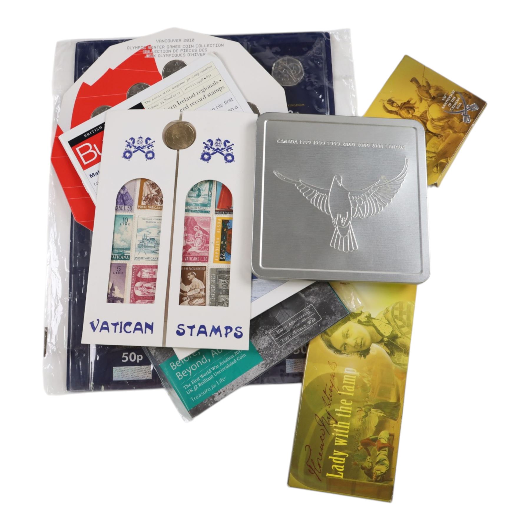 Approximately 104 Royal Mail Royal Mint coin or medallion covers, housed in an official Royal Mail Royal Mint ring binder folder and loose, together with The Queen's Golden Jubilee Coin Cover Collection in two albums, commemorative fifty pences, crowns, etc