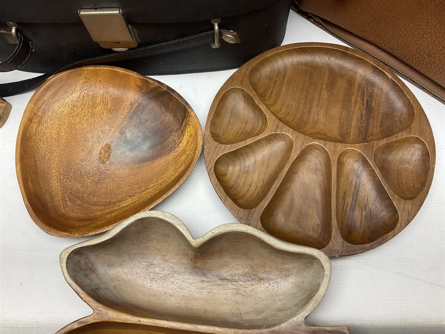 Brass oil lamp, with etched floral glass shade, leather Gladstone style doctors bag, leather satchel and vintage vanity case, three graduating wooden giraffes and other wood and metal ware, lamp H54cm