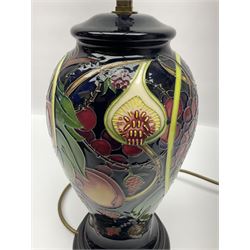 Moorcroft table lamp of baluster form, decorated in the Queens Choice pattern by Emma Bossons, H49cm