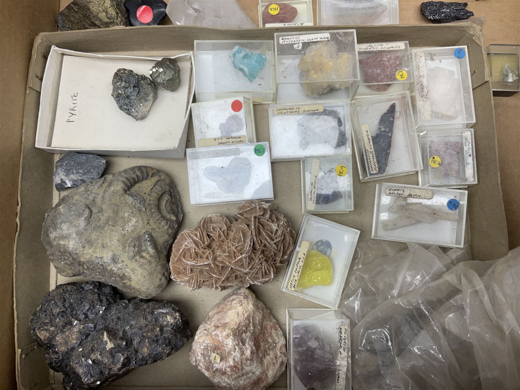 Natural history; Collection of rock and mineral specimens to include muscovite, sphalerite zinc blende, breccia, migmatite, fluorite etc, housed in a wood box, some named 