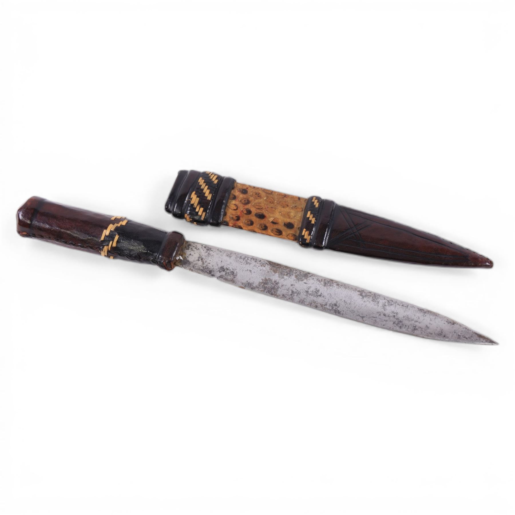 African dagger, with leather handle and scabbard, overall L32cm