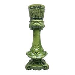 Jardiniere and stand, the jardiniere modelled as a pale, the stand with foliate and foliage decoration on a green ground, stand H73cm 