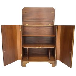 John More of Scarborough -  Edwardian Revival 'Canterbury Cabinet' inlaid mahogany cabinet, fitted with double cupboard decorated with urn motif inlays and banding, flanked by canted fluted uprights, on bracket feet