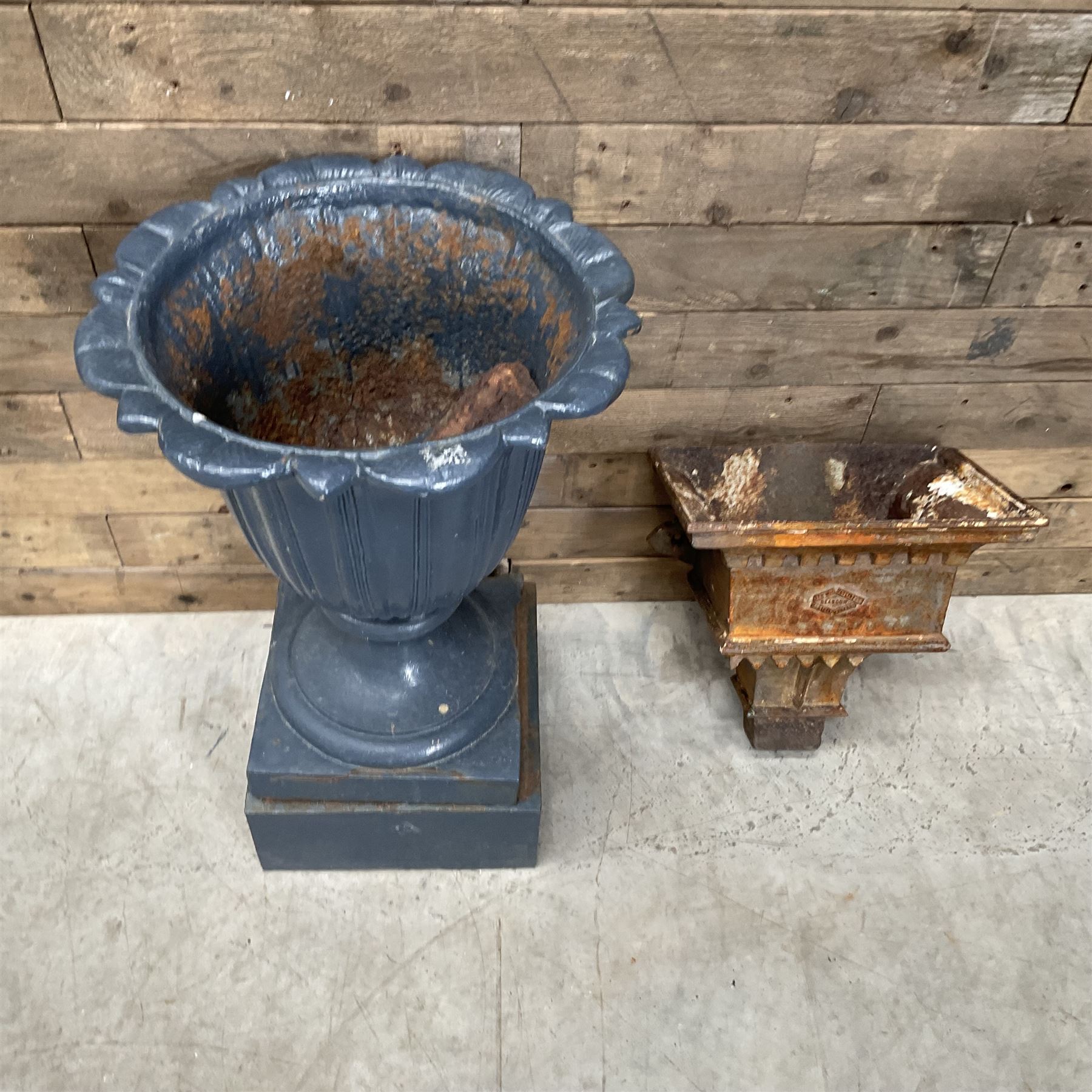 19th century blue painted cast iron lotus garden urn with plinth, and a cast iron rain hopper
