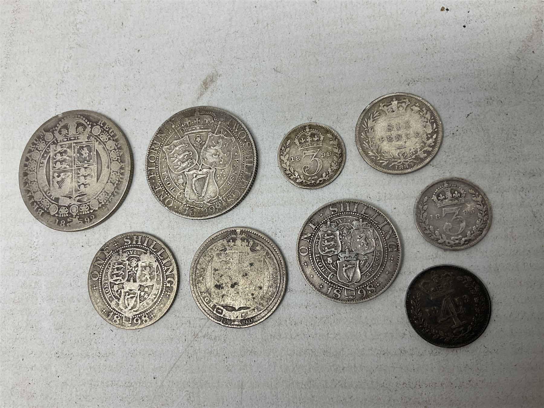 Approximately 120 grams of Great British pre 1920 silver coins, including George III 1819 half crown, William IIII 1834 shilling, Queen Victoria 1892 half crown, various silver threepence pieces etc