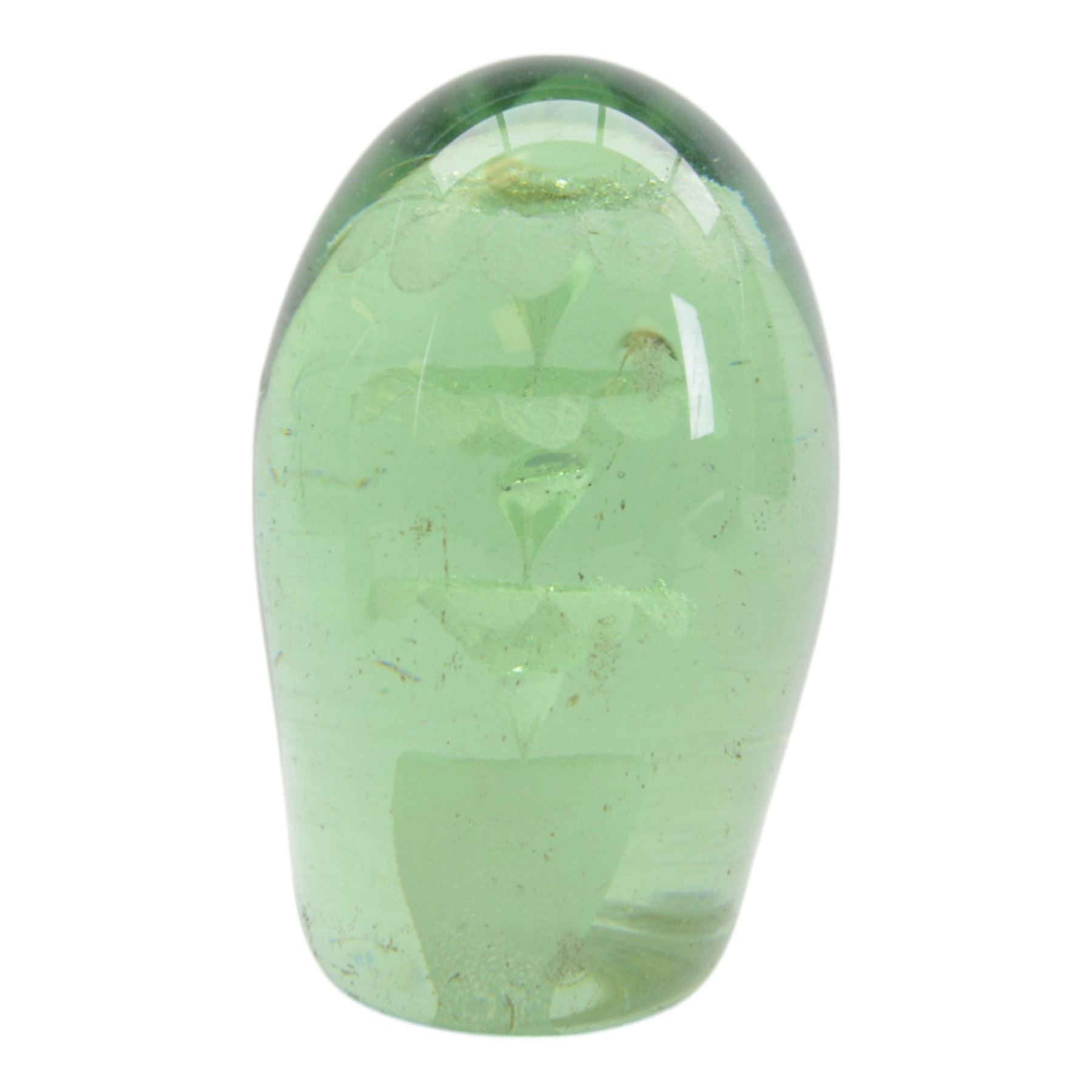 Three Victorian green glass dump paperweight with floral sulphur inclusions, H14cm