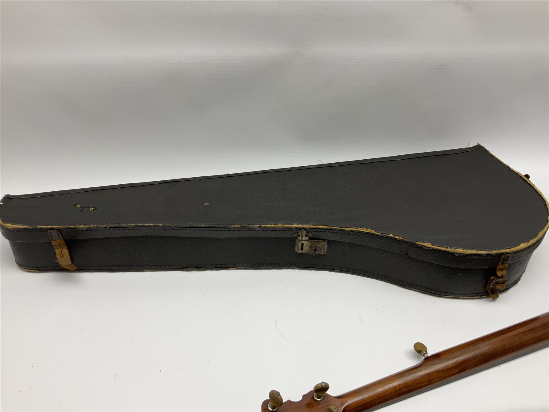 Five-string banjo by Clifford Essex Co. 15A Grafton Street, Bond Street, London W, with mother-of-pearl inlaid ebony fingerboard L92cm; in carrying case with strap