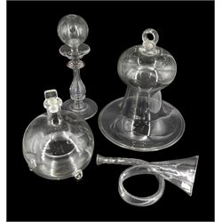 Group of 19th century glass, comprising smoke bell with folded rim, H25cm, fly catcher, H18cm, lace makers lamp with globular reservoir upon a baluster stem and circular spreading foot, H26cm, and frigger in the form of a bugle, H20.5cm