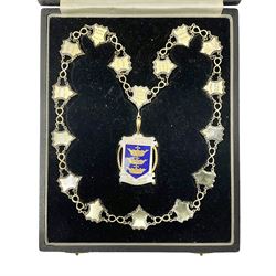 1920s 9ct gold enamel pendant inscribed 'Hull Municipal Technical College Old Boys Association', with presentation engraving verso, hallmarked W H Haseler Ltd, Birmingham 1929, suspended from a silver chain of office, with sixteen engraved shield links, hallmarked W H Haseler Ltd, Birmingham 1933, contained within fitted case 