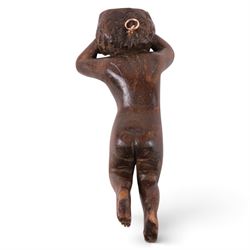 18th century carved oak cherub, with hands raised behind head, H26cm 