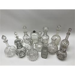 A collection of 19th century and later decanters, (majority with associated stoppers), of various form including mallet, ovoid, shaft-and-globe, etc. 