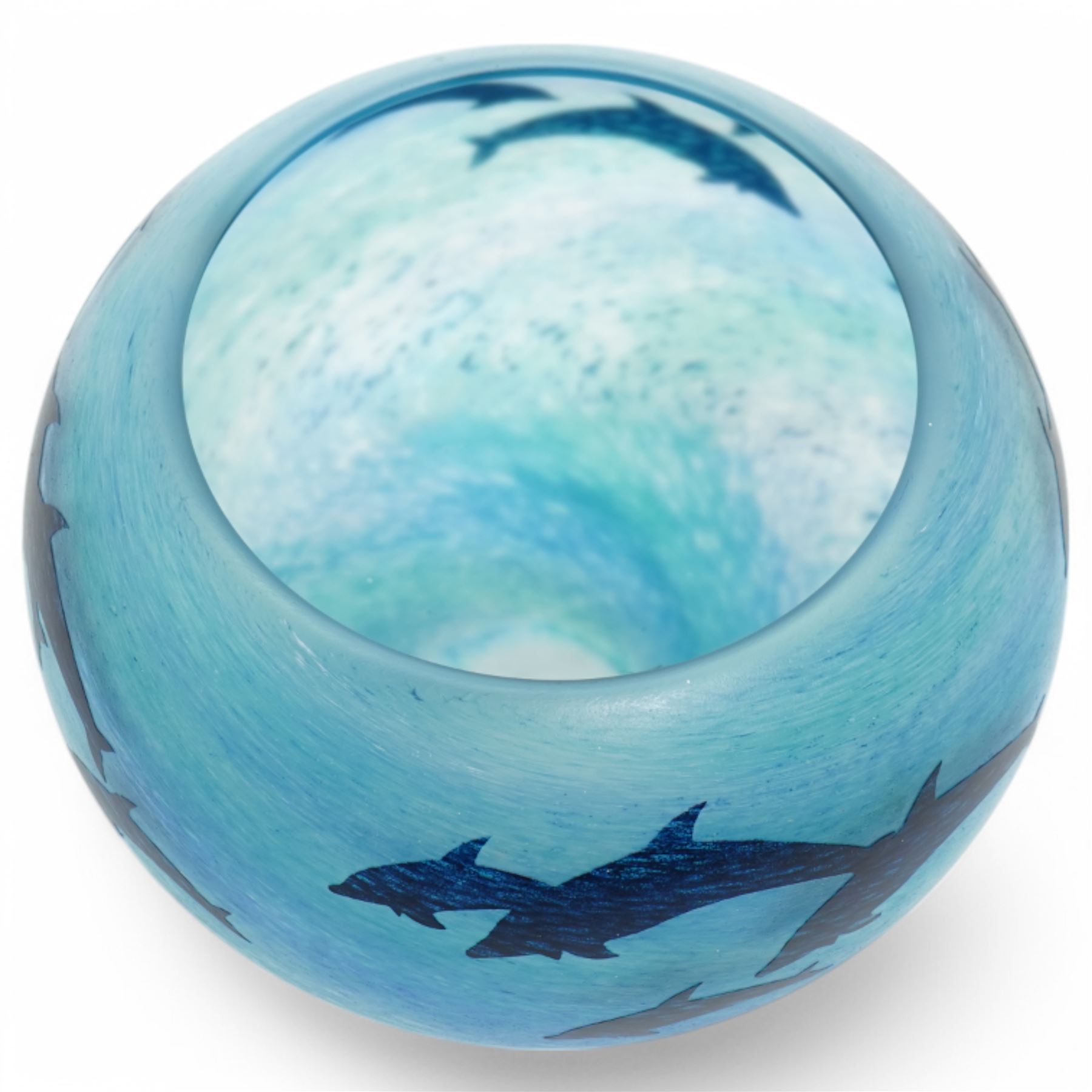 Malcolm Sutcliffe (British 1954-): Studio glass cameo bowl, the body mottled and speckled with shades of blue decorated with dolphins, etched signature, D10cm