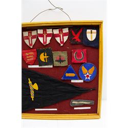 Fifteen WWII insignia cloth badges, including Channel Islands Liberation Force, 13th Infantry Division, British 78th infantry, 1st Army formation sign, USAAF WWII shoulder flashes, etc, all within a framed display H36cm,  W37cm   