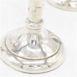 Two pairs of early 20th century silver vases, comprising pair of Edwardian trumpet vases with fluted rims upon a circular domed foot, hallmarked S Blanckensee & Son Ltd, Chester 1907, and a smaller 1920s pair, hallmarked Chester 1920, maker's mark worn and indistinct, tallest H19cm