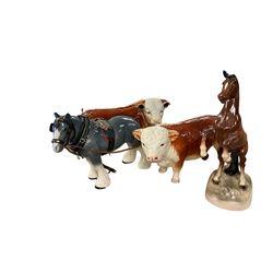 Two ceramic bulls, and two ceramic horses, tallest H27cm