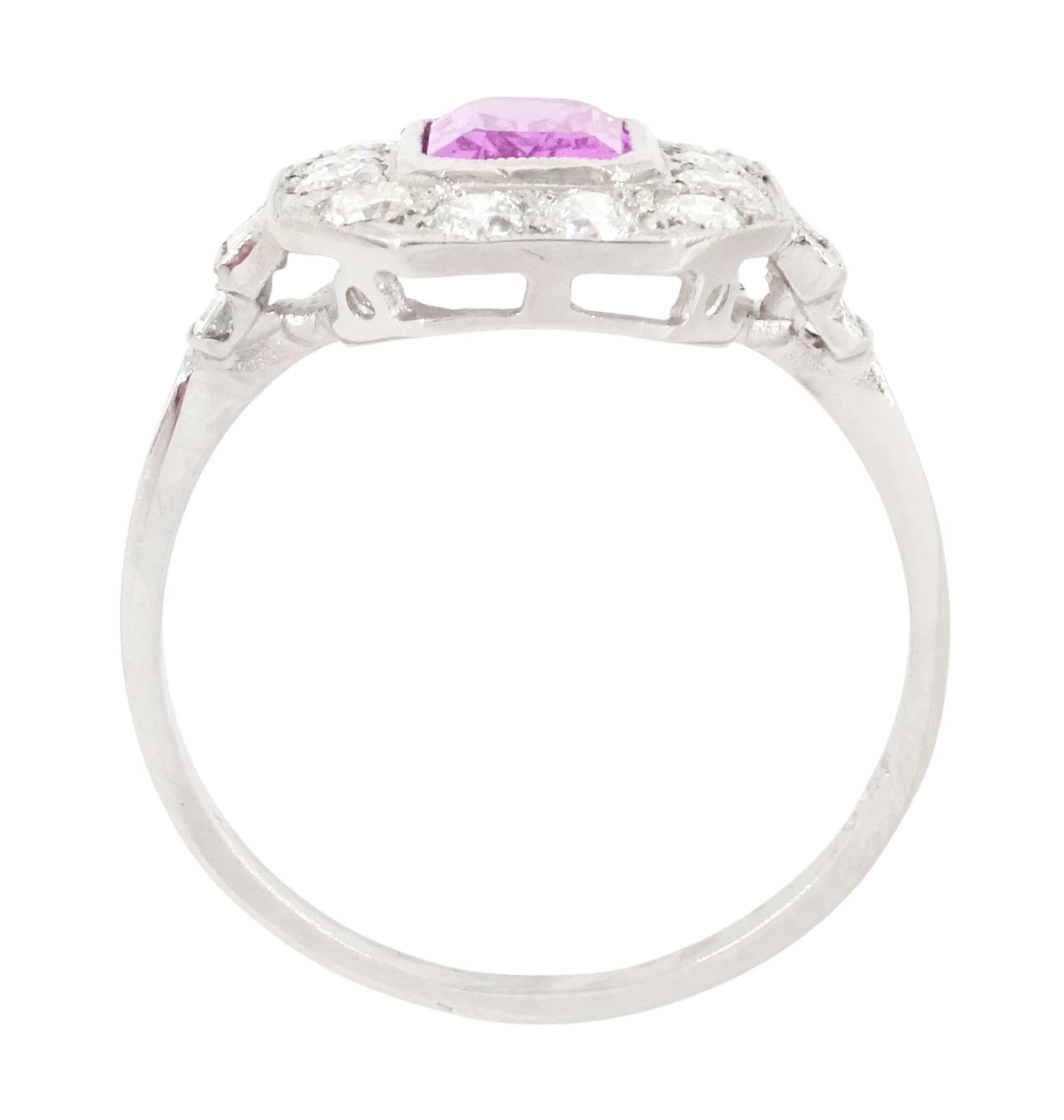 Platinum pink sapphire and diamond milgrain set cluster ring, single octagonal cut sapphire of approx 0.95 carat, surrounded by twelve old cut diamonds, with baguette cut diamond shoulders, stamped Plat, total diamond weight approx 0.70 carat
