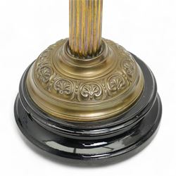 Victorian brass column table oil lamp with pink glass reservoir and etched shade H61cm and a smaller lamp with opaque shade