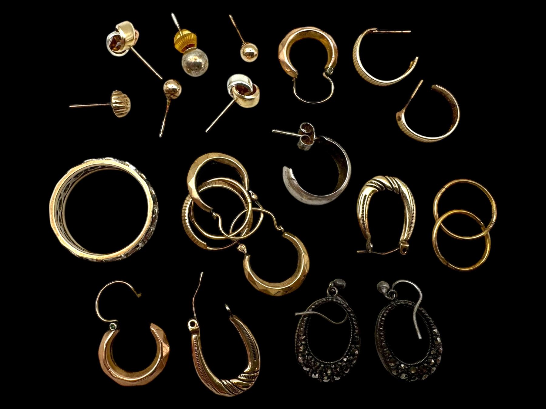 9ct gold earrings, including hoop earrings and knot earrings, together with a 9ct gold paste set eternity ring and a pair of silver marcasite earrings 