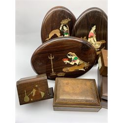 Three Chinese carved giltwood panels, three Indian oval plaques inlaid with figures, similar boxes etc
