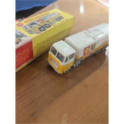 Three Dinky Toys diecast vehicles, comprising Field Marshall Tractor no. 301, Shell BP Fuel Tanker no. 944 and Snow Plough no. 958, all boxed