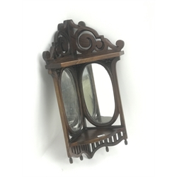  20th century mahogany wall hanging corner shelf fitted with two oval mirrors, W45cm, H83cm, D34cm  
