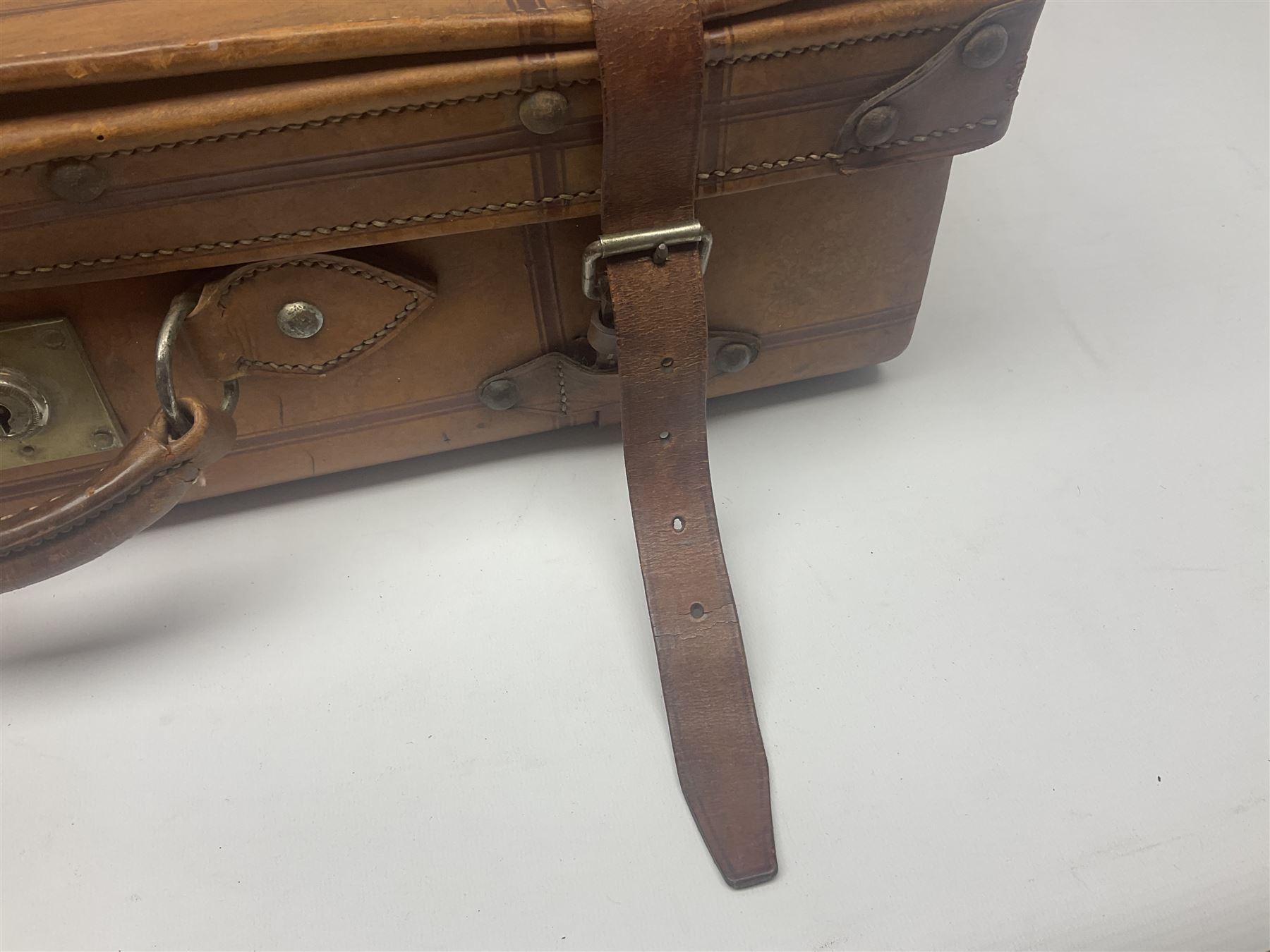 Late 19th/early 20th century stitched and studded leather portmanteau type suitcase with expanding lid and straps, L61cm