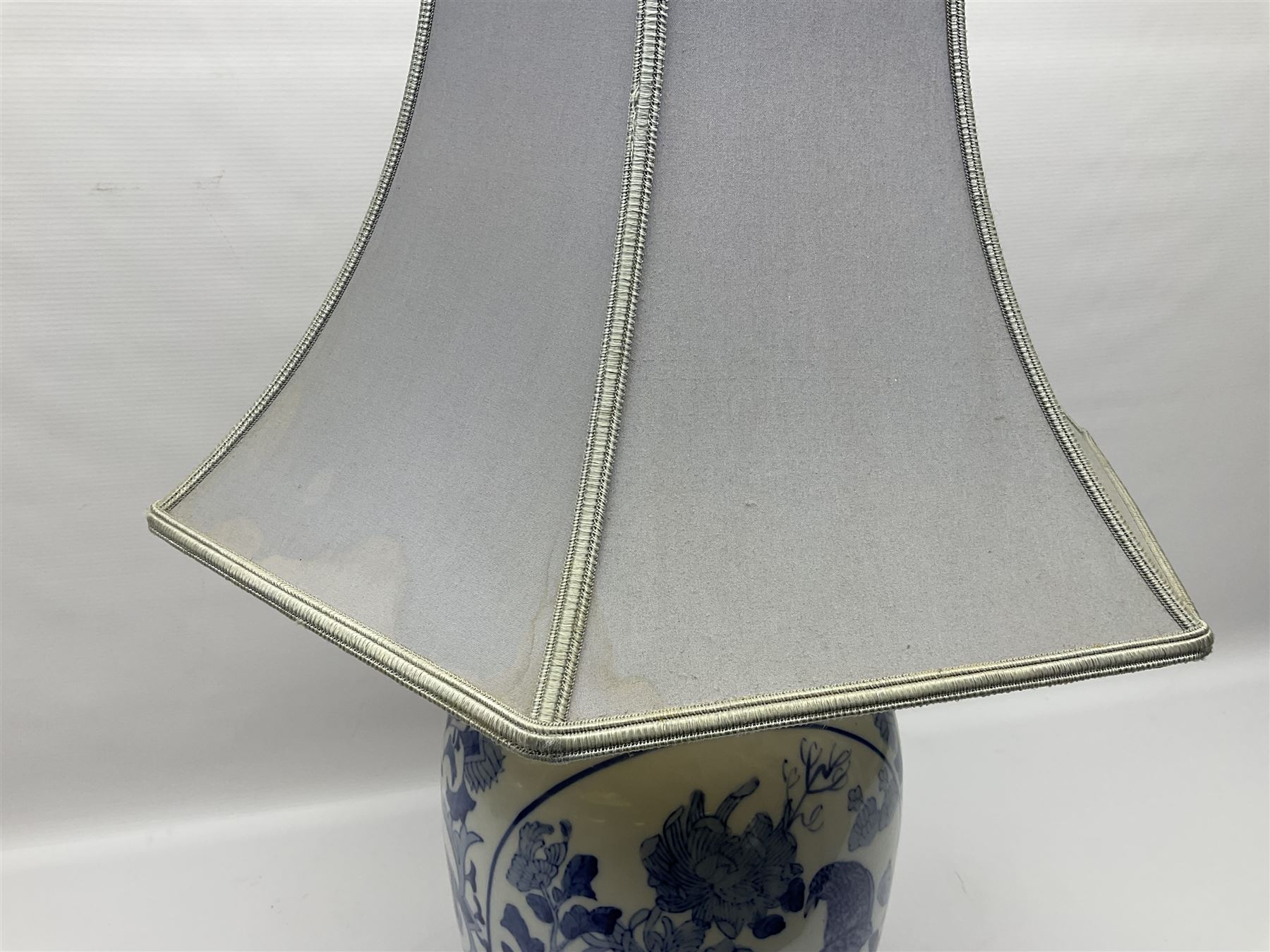 Chinese blue and white table lamp of baluster form, decorated with birds and floral displays, on hardwood base with shade, H78cm