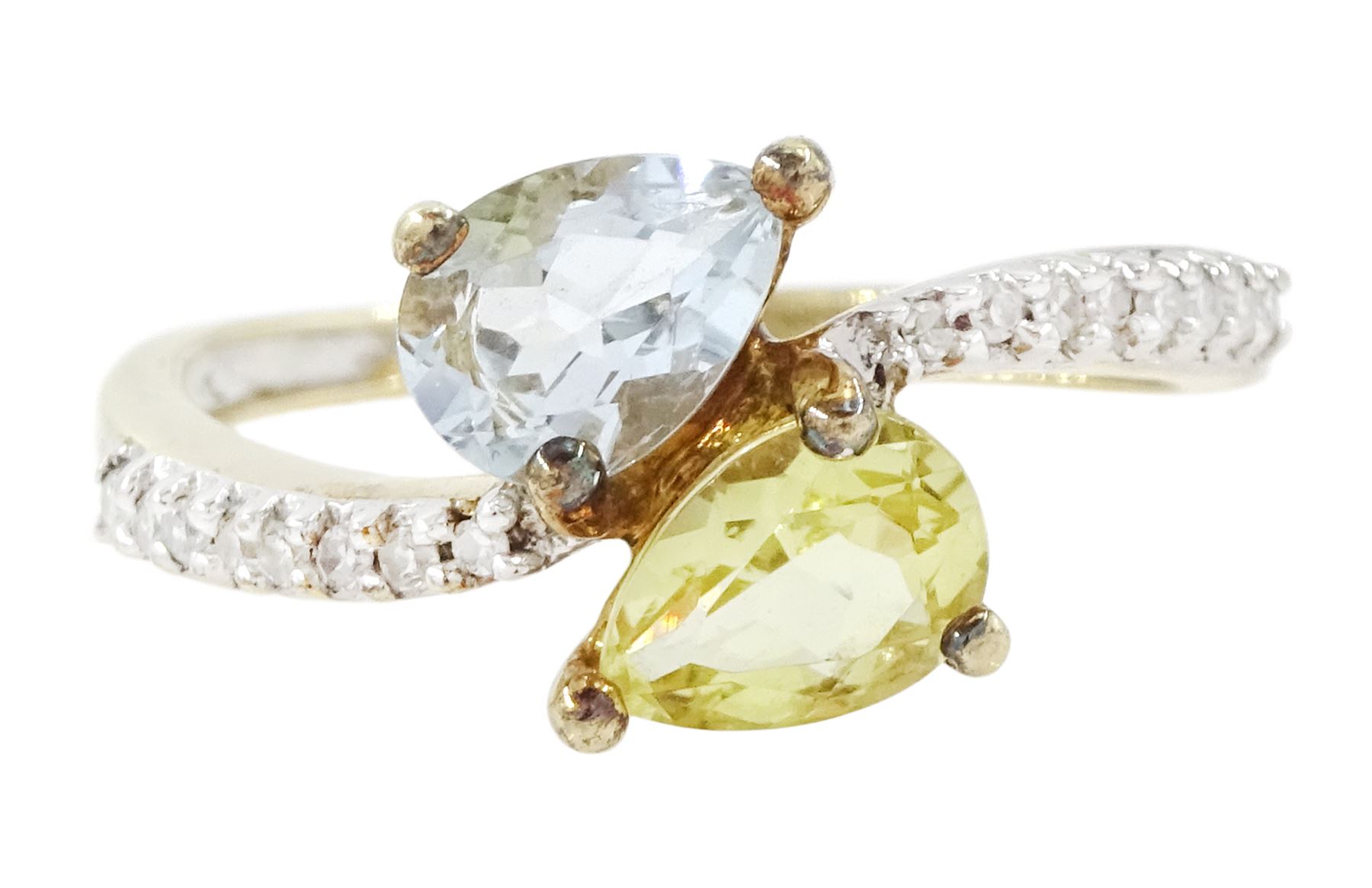 9ct white gold quartz, aquamarine and diamond crossover ring, single pear cut aquamarine and yellow / green quartz, with diamond set shoulders, Birmingham 2004