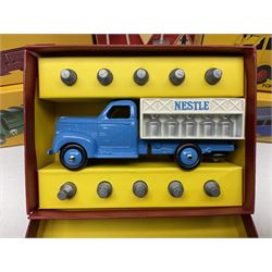 Ten Atlas Dinky die-cast models and accessories including, Bedford TK Tipper no. 435, Austin Wagon no. 412, two Miniatures, 25 O Camion Laiter, 'Panneaux De Signalisation Routiere' and others (10)