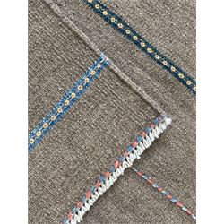 Shiraz Kilim rug, decorated with multi-coloured and patterned horizontal lines 