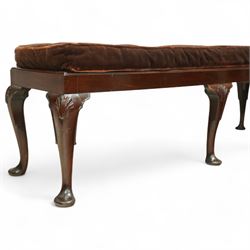 Early 20th century mahogany window seat in the George II style, with rectangular padded seat upholstered in brown velvet, raised on cabriole legs with carved shell knees and pad feet