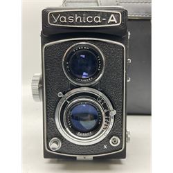 Yashica-A camera body, serial no. A4080073, with 'Yashikor 1:3.5 f=80mm' lens, serial no. 209272 and 'Yashikor 1:3.5f=80mm' lens, serial no 22942, together with Yashica TL-Electro camera body, serial no. 5054162 with 'Yashinon-DS 50mm 1:1.9  40056038