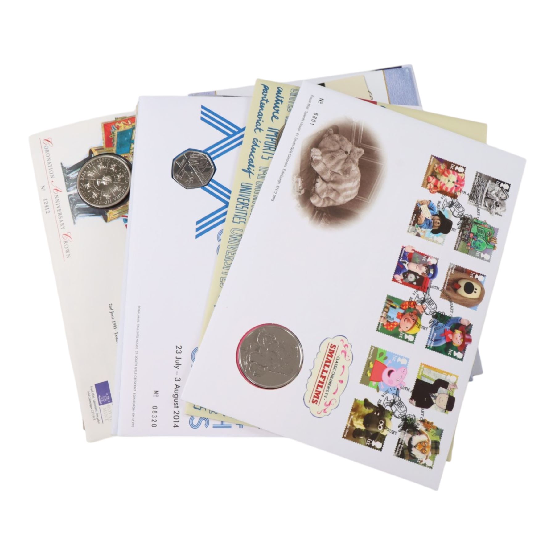 Approximately 104 Royal Mail Royal Mint coin or medallion covers, housed in an official Royal Mail Royal Mint ring binder folder and loose, together with The Queen's Golden Jubilee Coin Cover Collection in two albums, commemorative fifty pences, crowns, etc