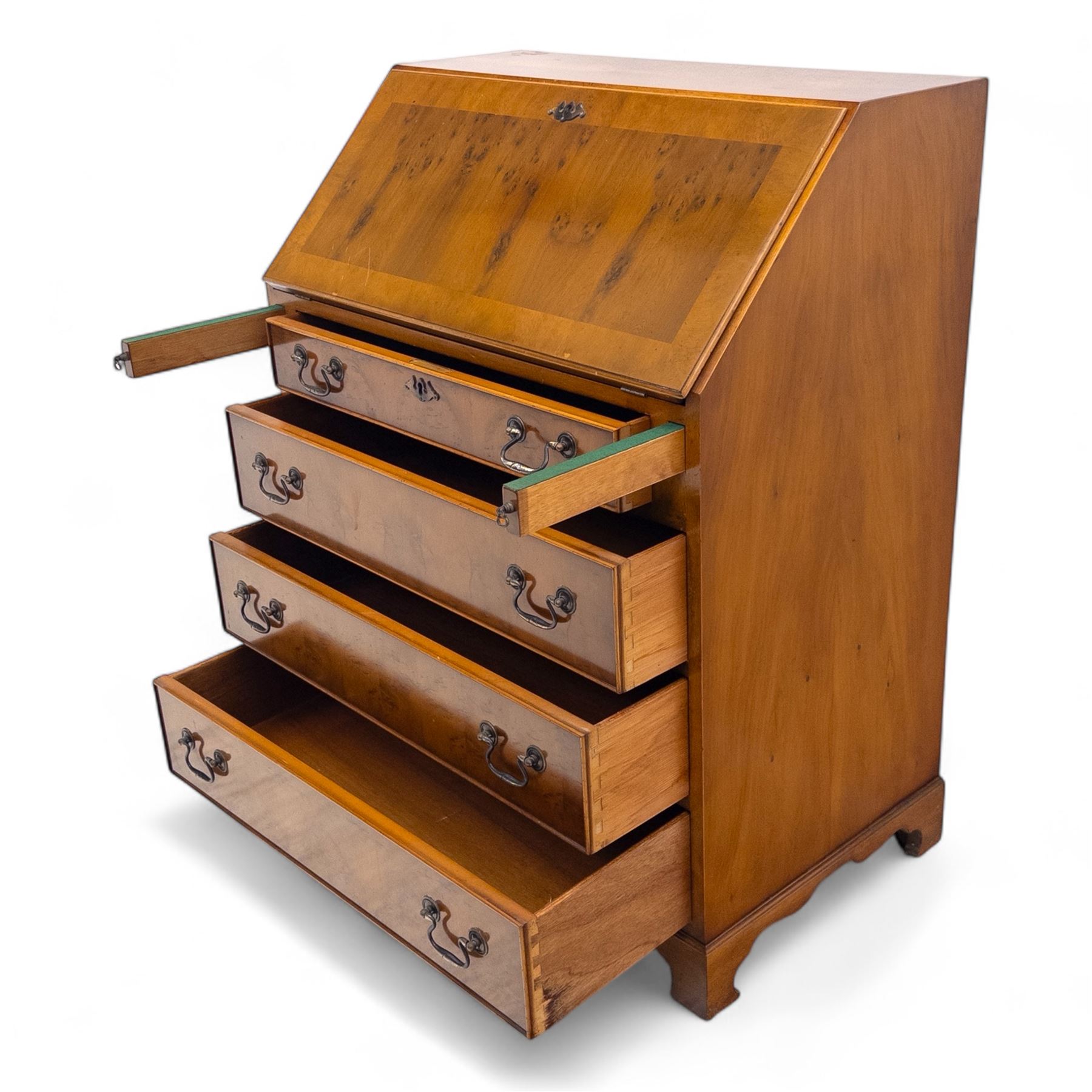 Mid-20th-century Georgian design cherrywood and burr walnut  veneered bureau, fall front with inset tooled leather writing surface revealing a fitted interior with small drawers and pigeon holes, and a central cupboard with oval inlay, over four long graduated drawers, raised on shaped bracket feet 