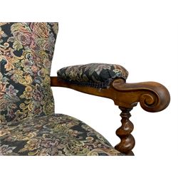 Victorian walnut framed open armchair, scrolled arm terminals over spiral turned arm supports, upholstered in foliate patterned fabric with sprung seat, on turned supports and brass castors (W65cm H92cm); and Victorian mahogany nursing chair with lobe carved supports (W60cm H92cm)