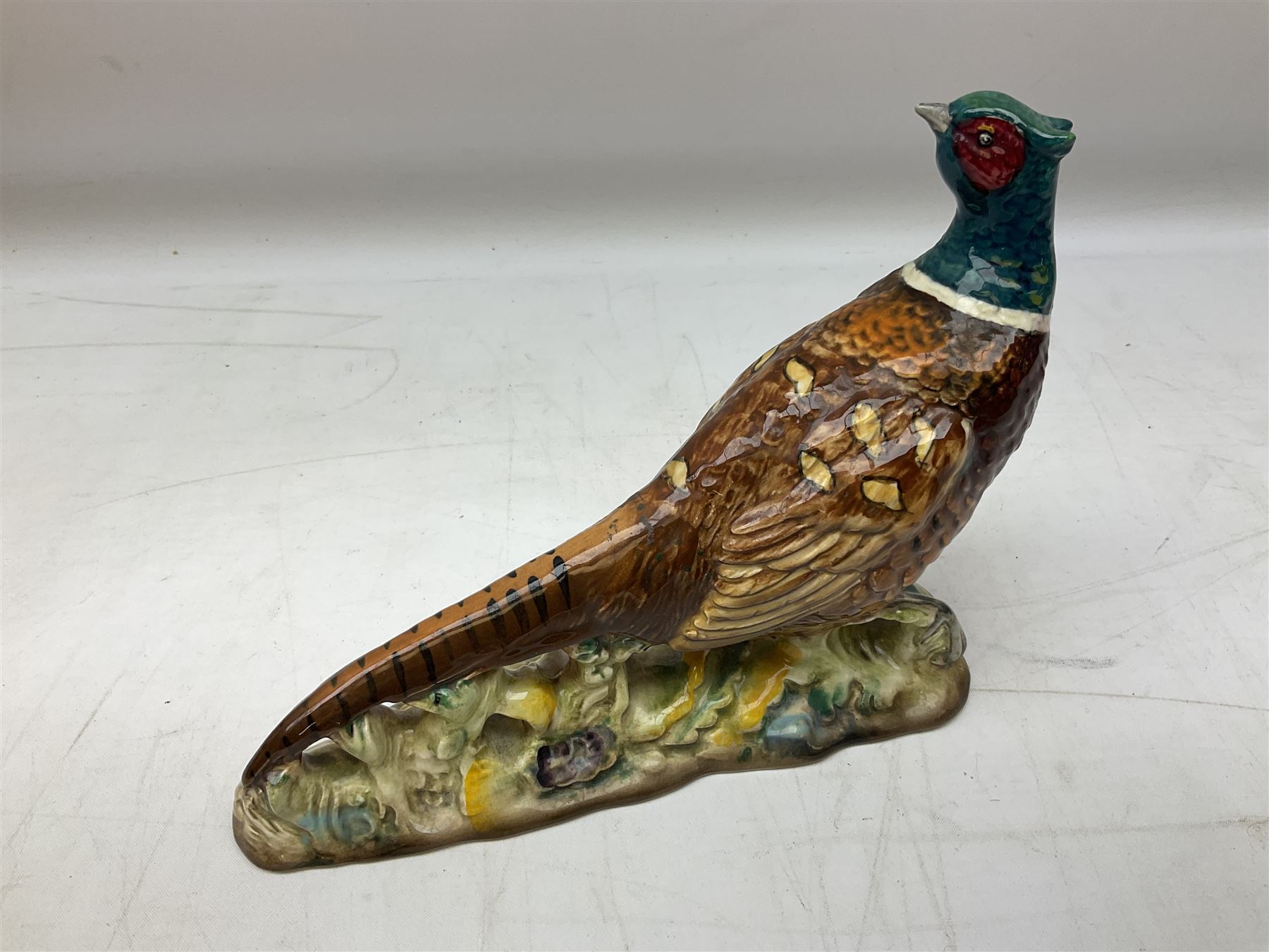 Six Beswick bird figures comprising large barn owl no.1046, small barn owl no.2026, woodpecker no.1218, pheasant no. 1226b and two small pheasants no.767a, tallest H22cm  