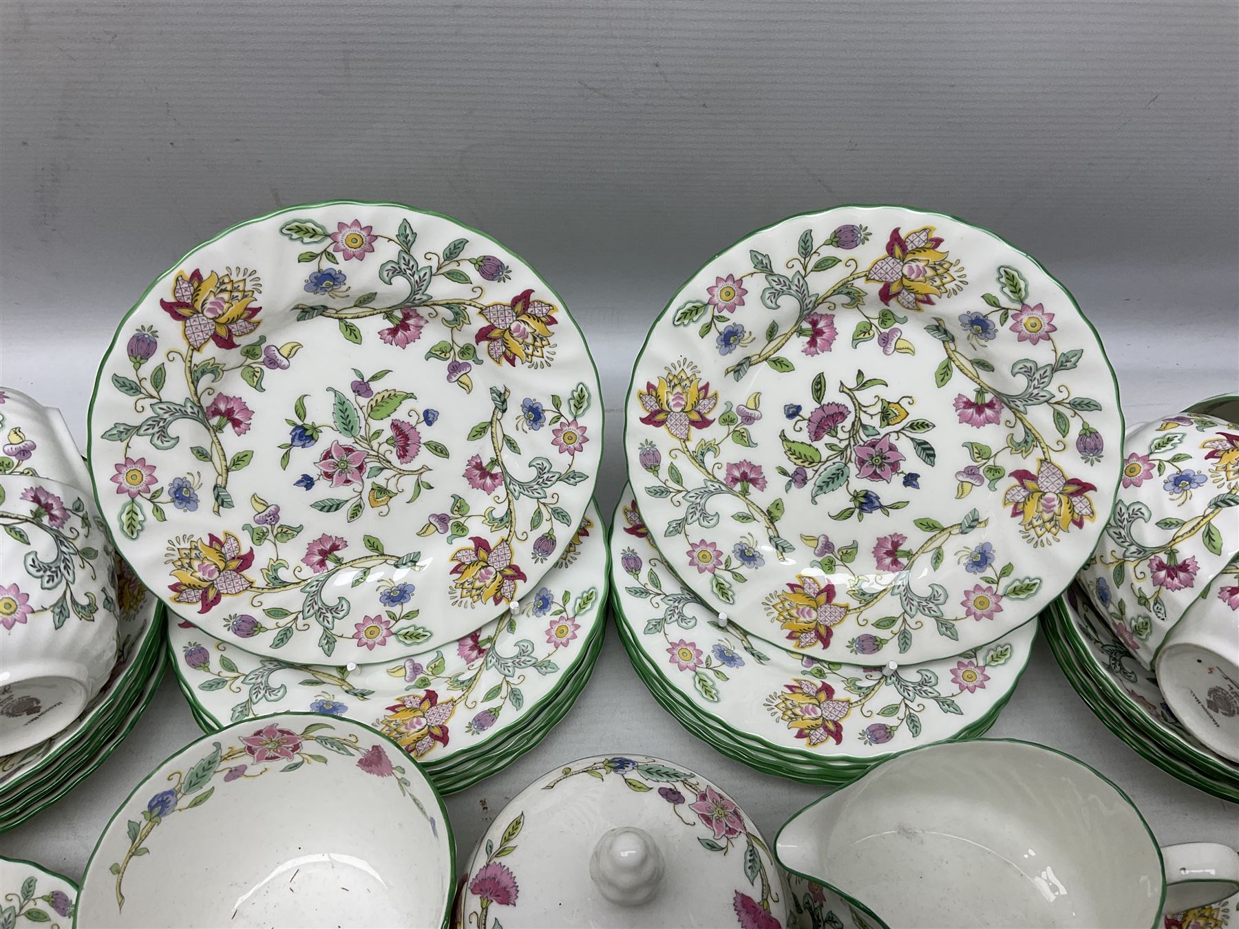 Minton Haddon Hall pattern tea wares comprising twelve teacup trios
