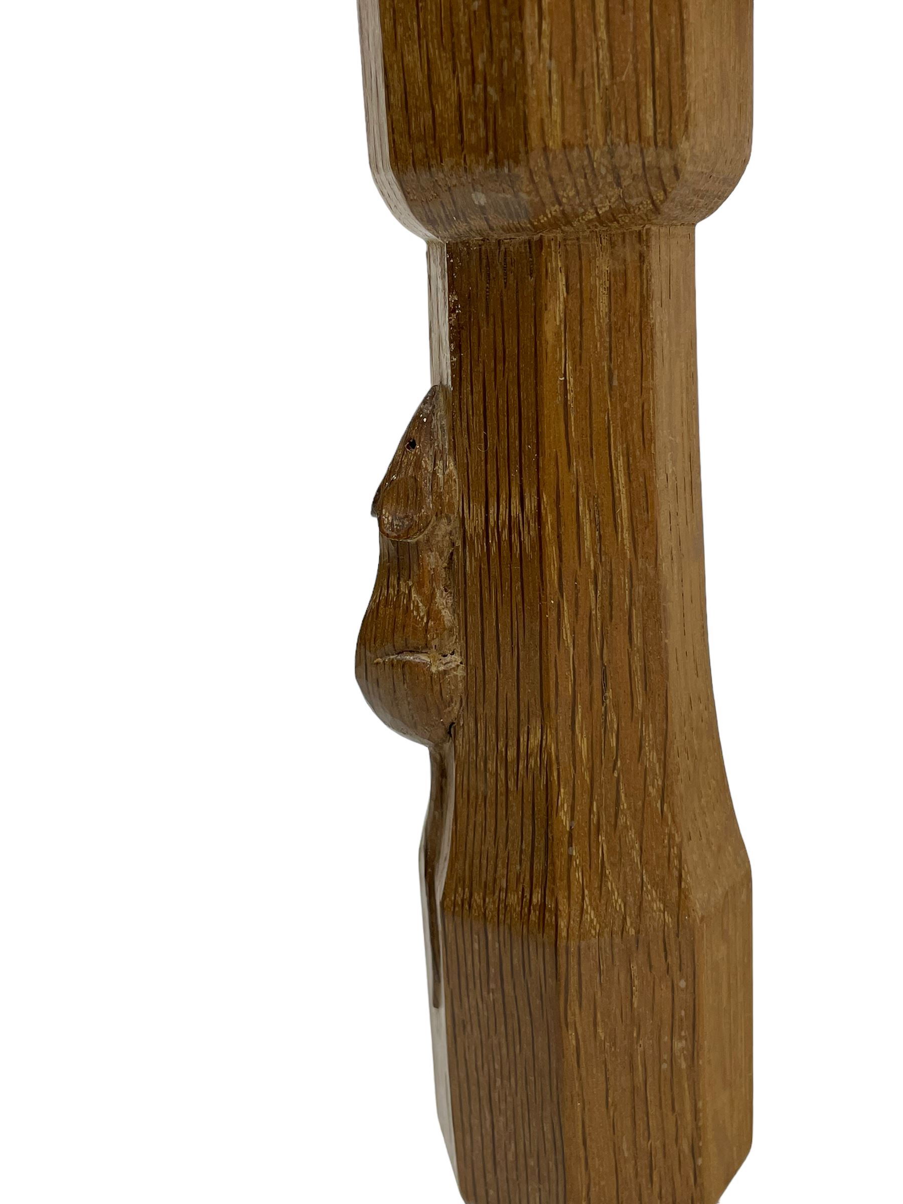 Mouseman - oak carver elbow chair, pierced and carved lattice back over leather upholstered seat with stud band, on octagonal supports united by plain stretchers, carved with mouse signature, by the workshop of Robert Thompson, Kilburn 