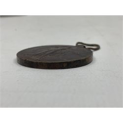 Two silver Georgian tablespoons, approximate total weight 3.36 ozt (104.7 grams), together with Great War Peace Medal 1919 and two others 