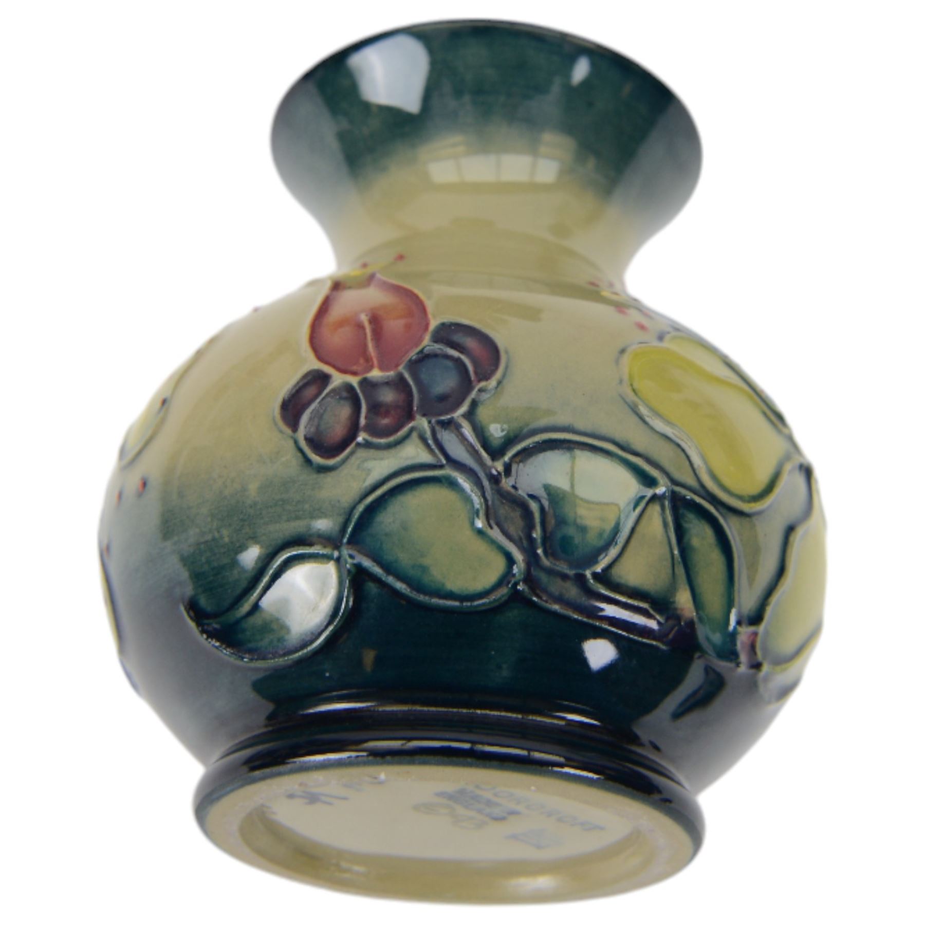 Moorcroft vase in Hypericum pattern, of baluster form, in original box, together with a Moorcroft covered dish in Simeon pattern, both with printed marks beneath, vase H10cm