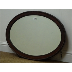  Oval mahogany framed bevel edge mirror, W80cm, H54cm  