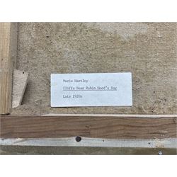 Marie Hartley (Yorkshire 1905-2006): 'Cliffs near Robin Hood's Bay', oil on canvas signed, titled on printed label verso 25cm x 35cm