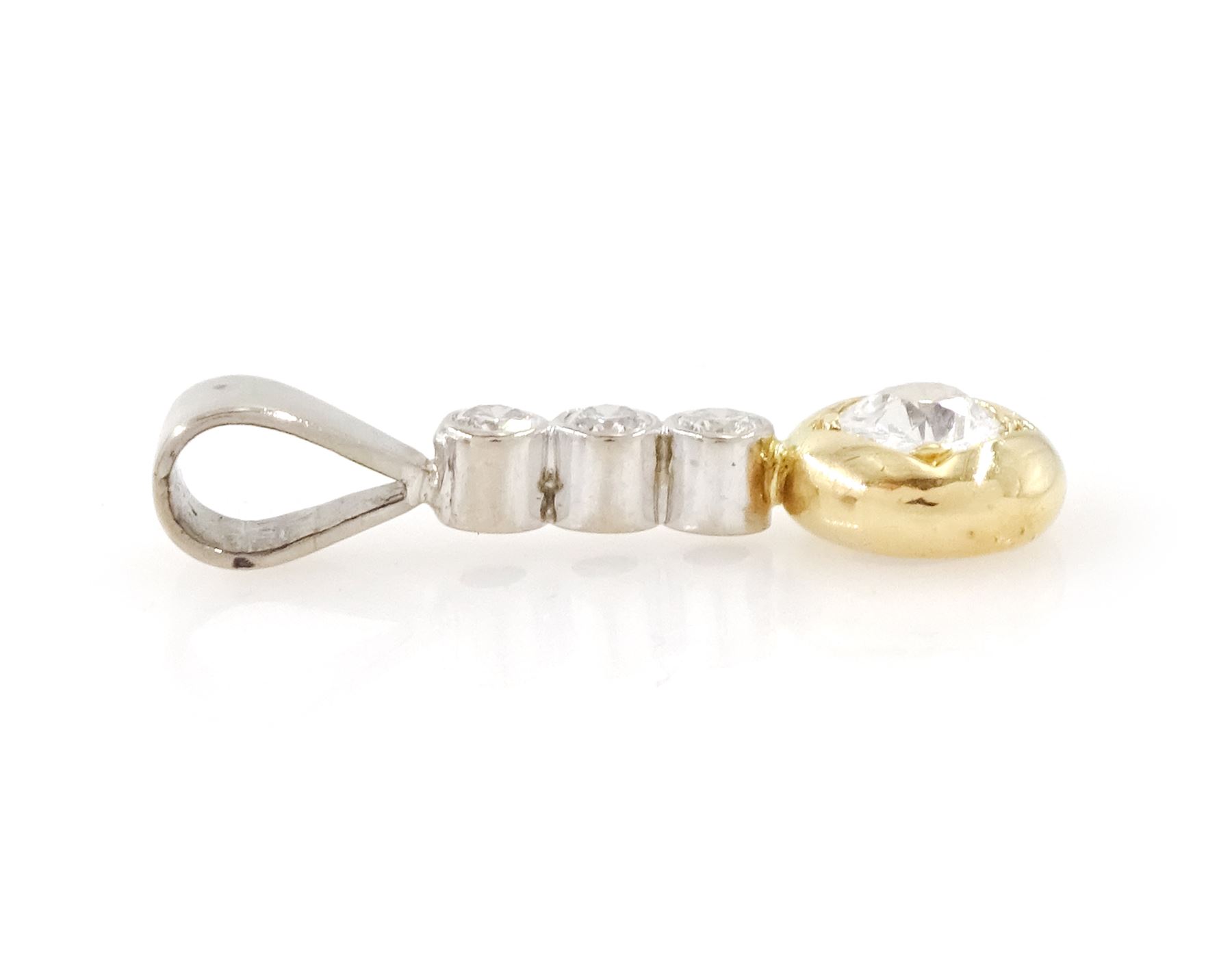 18ct gold diamond pendant, principal old cut diamond of approx 0.30 carat, set in yellow gold, suspending from three round brilliant cut diamonds, set in white gold, total diamond weight approx 0.50 carat