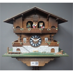  Swiss chalet style cuckoo clock, triple weight driven musical movement, W31cm  